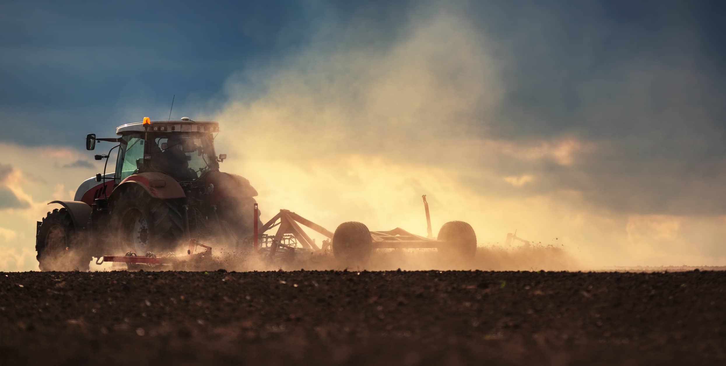 photo of tractor planting seeds